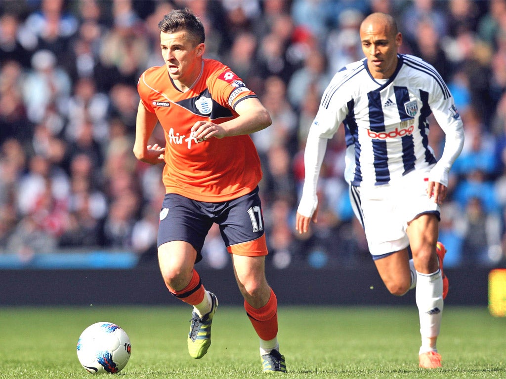 QPR midfielder Joey Barton in action against West Bromwich Albion