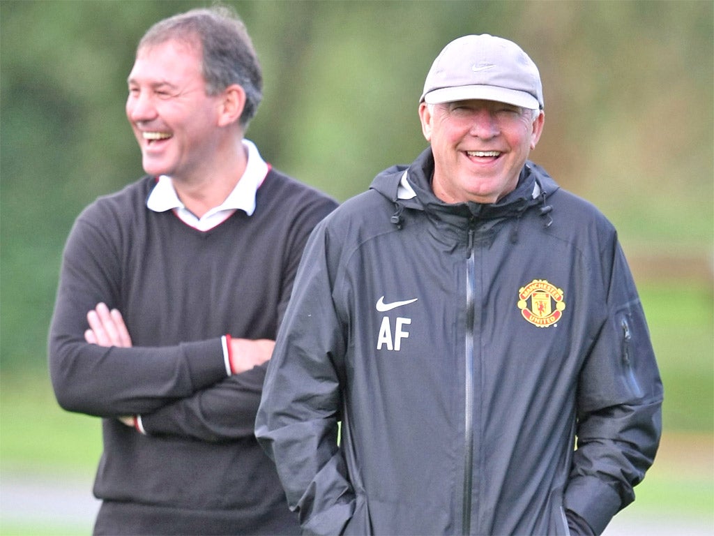 Bryan Robson and Alex Ferguson at United's training ground