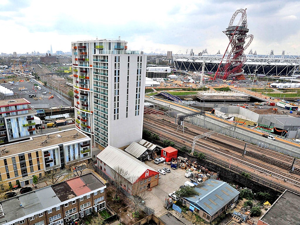 A view of housing and the Olympic Stadium in Newham, east London