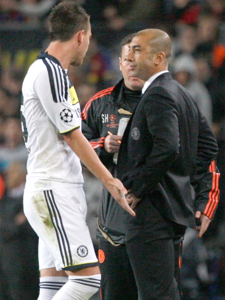 John Terry tries to explain his sending off to Roberto Di Matteo