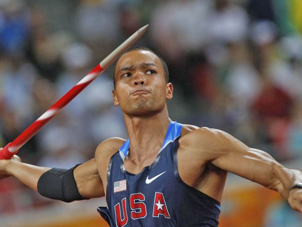 Olympic champion Bryan Clay hurls the javelin in the Beijing Games