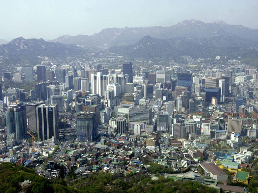 Head for heights: A view of the city from the observation deck of Seoul Tower