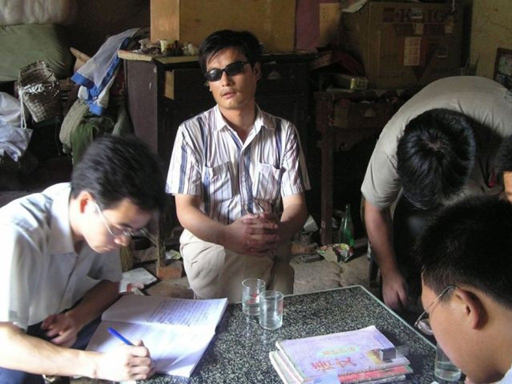 Chen Guangcheng had been detained in his home since 2010 after
serving a four-year jail term for 'organising a mob to disturb traffic'