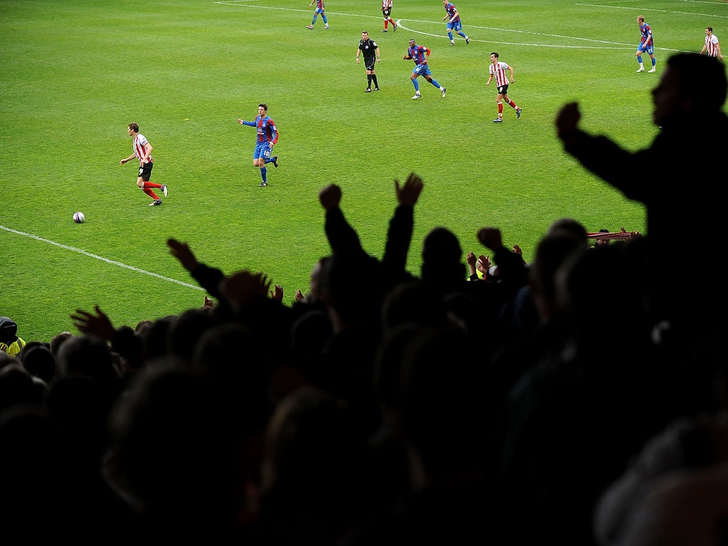 Southampton fans cheer on their side against Crystal Palace earlier this month