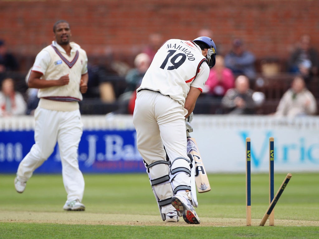 Lancashire's Sajid Mahmood is bowled by Somerset's Vernon
Philander at Taunton