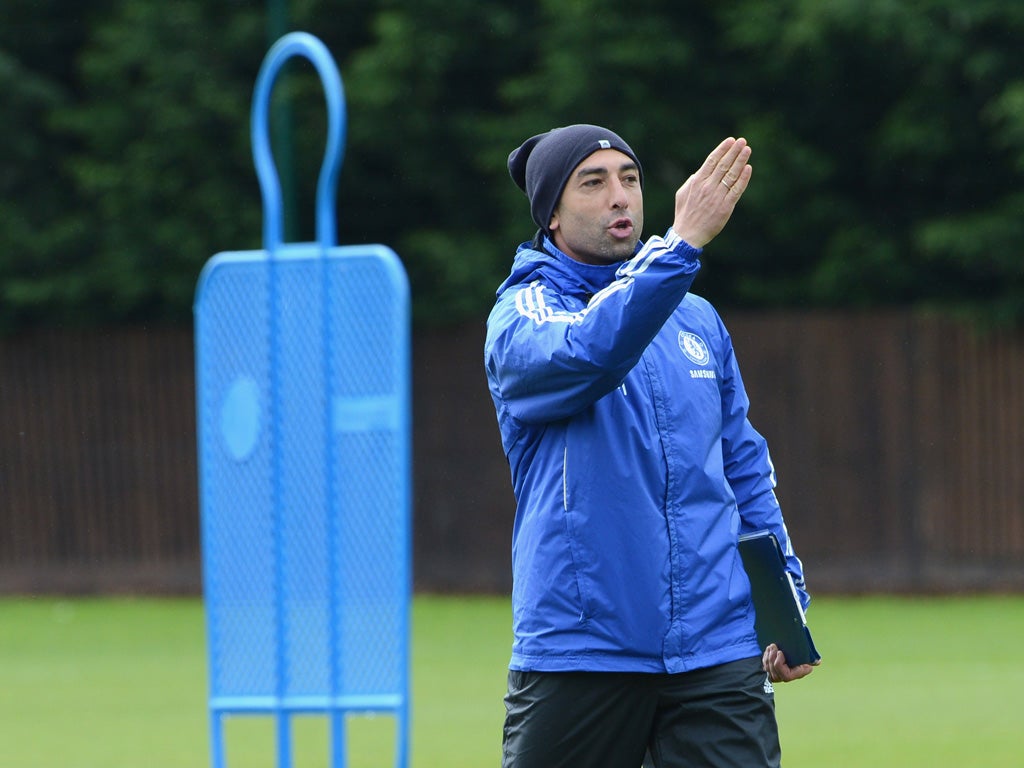 Roberto Di Matteo supervises training in Cobham yesterday