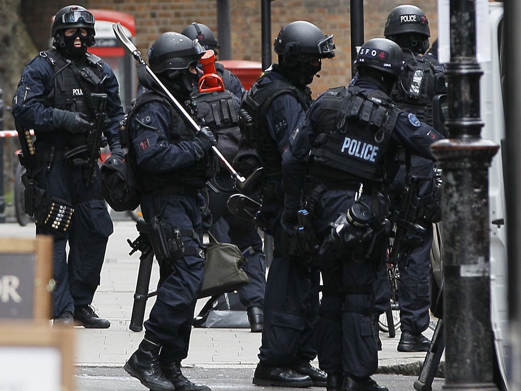 Armed police outside the building on Tottenham Court Road