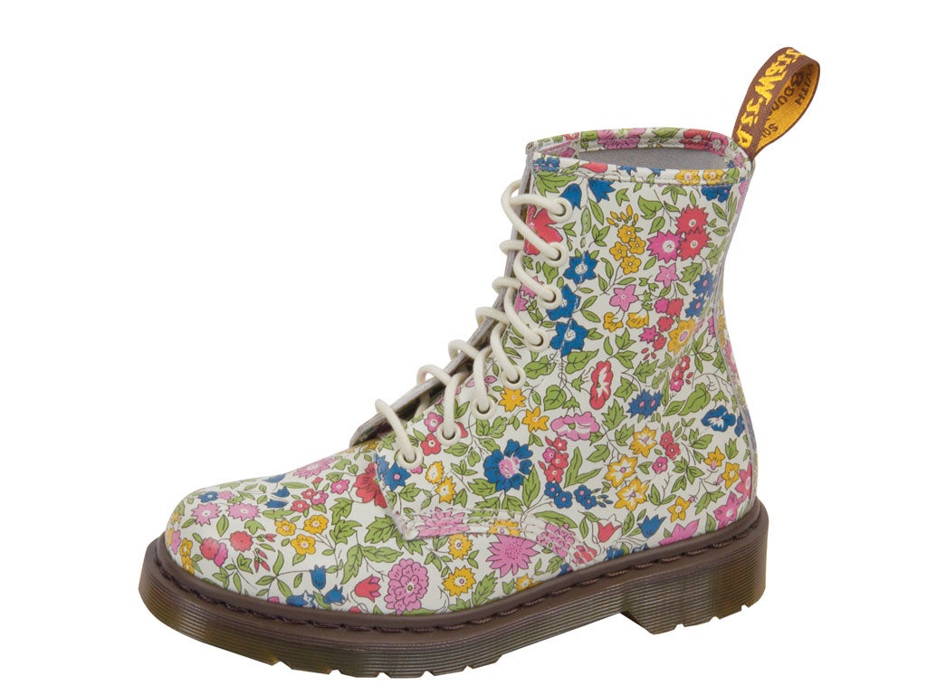 We Love: Taking liberties - these pretty printed classic eighteyelet rubber soled boots call for a floaty dress, a rich wine lip and plenty of angst. Angela Chase et al would die to be missing these. Liberty x Dr Martens, £170, liberty.co.uk