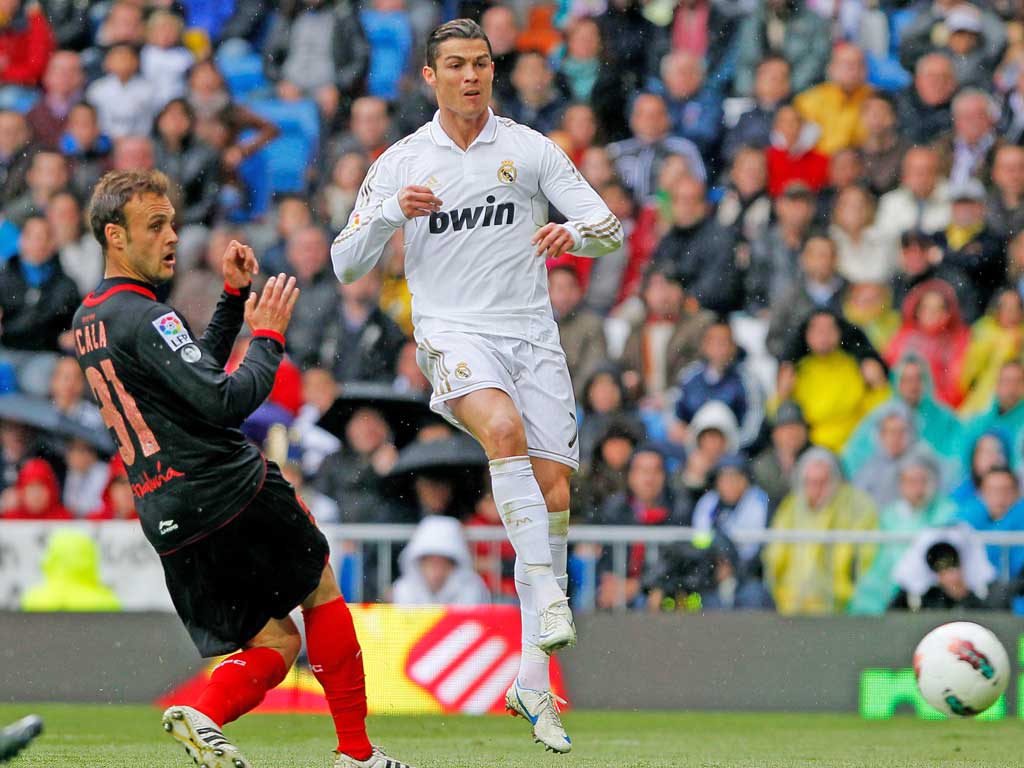 Cristiano Ronaldo scores his 43rd league goal of the season in Real Madrid’s 3-0 win over Sevilla