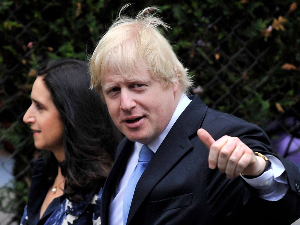 Boris Johnson with his wife Marina after casting his vote yesterday