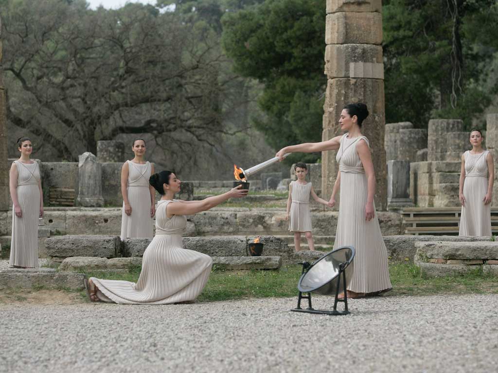The tradition of bringing the Olympic flame in a relay from Greece began at the Nazi-tainted 1936 Berlin Games. Under the guidance of Joseph Goebbels, 3,331 runners brought the flame from Olympia