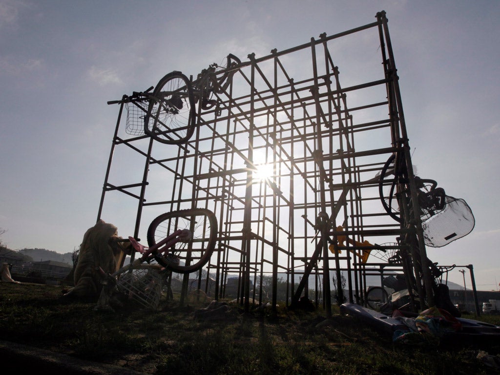Bicycles twisted around a jungle gym following a tornado in Tsukuba, north of Tokyo, Japan