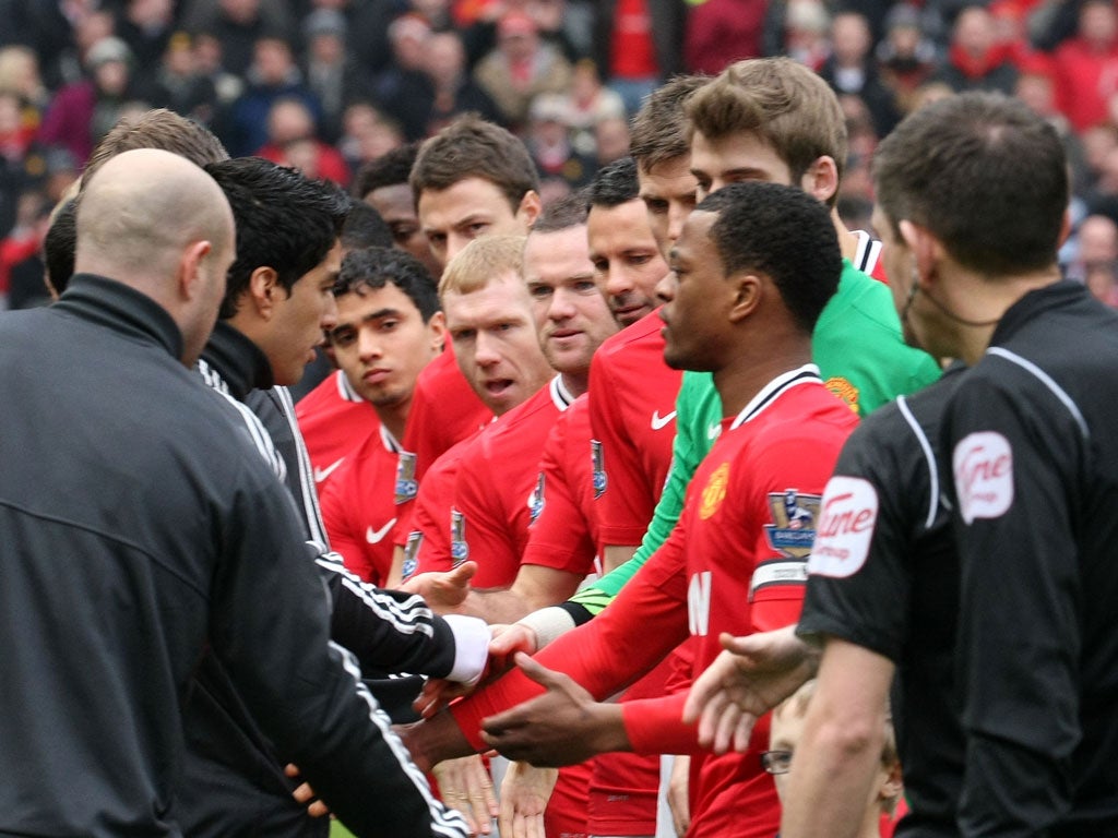 Take it as red The eyes of the world – certainly the United players – were on Luis Suarez as he opted to refuse to shake Patrice Evra’s hand.