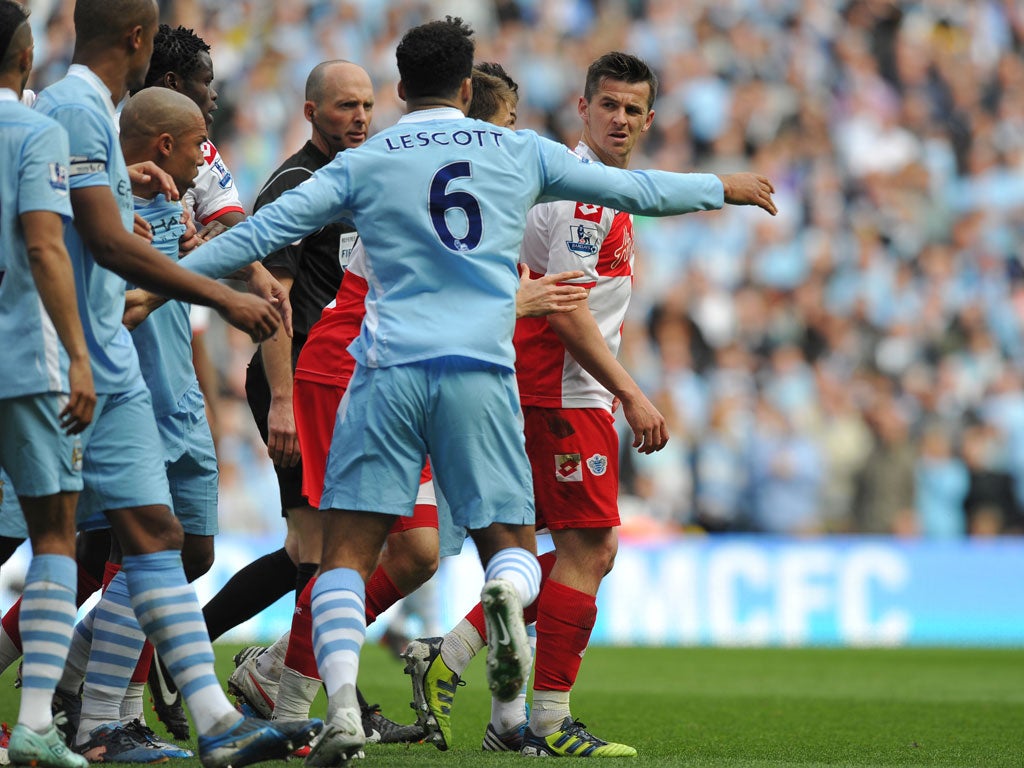 Joey Barton had to be ushered from the field