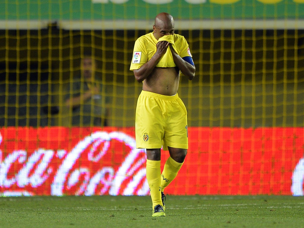 Villarreal's midfielder Marcos Senna reacts