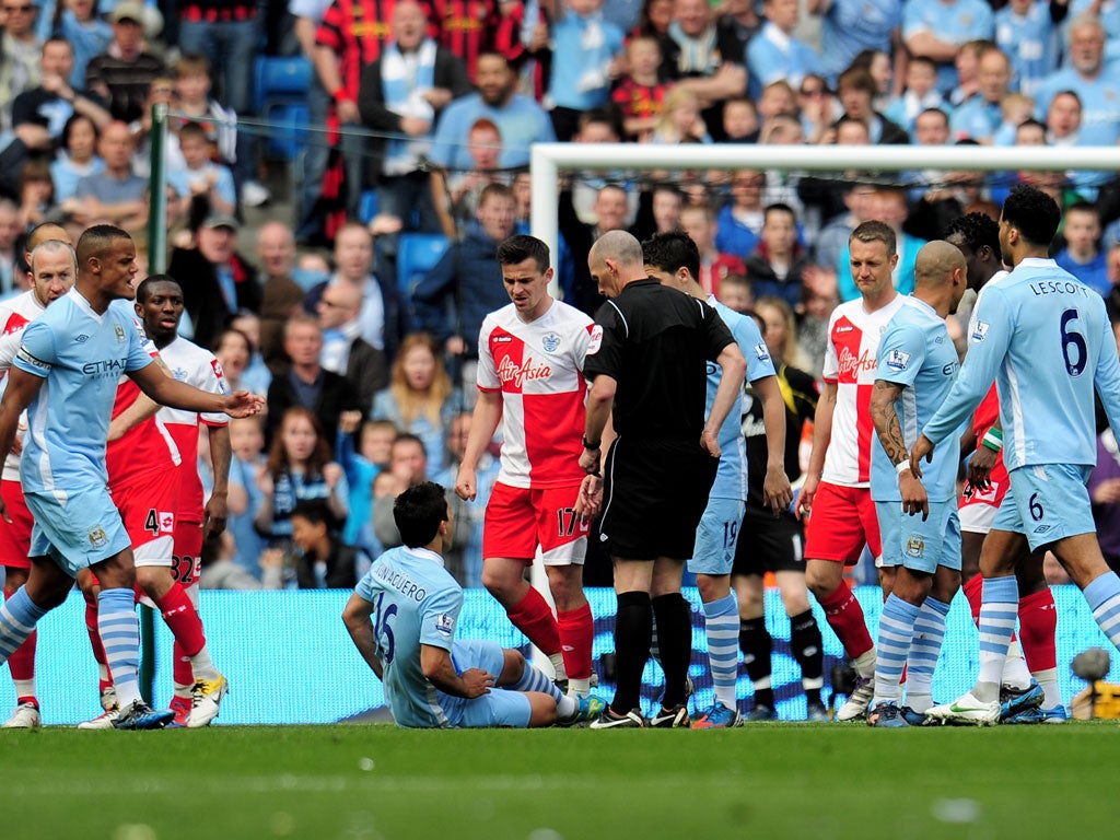 Joey Barton kicked out at Sergio Aguero