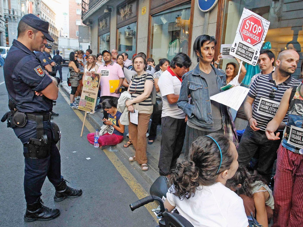 Protesters dubbed the ‘Indignant Ones’ in Madrid yesterday