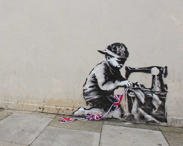 This work by Banksy, which appeared on a street in Wood Green last May, has been ripped out and will be auctioned in Miami