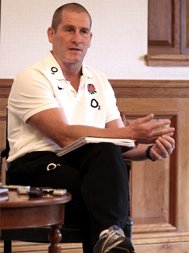 Stuart Lancaster addresses the media at Pennyhill Park yesterday