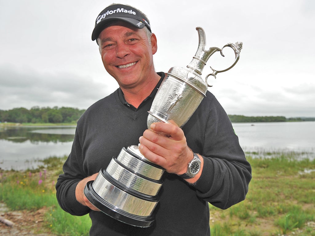 Darren Clarke celebrates victory