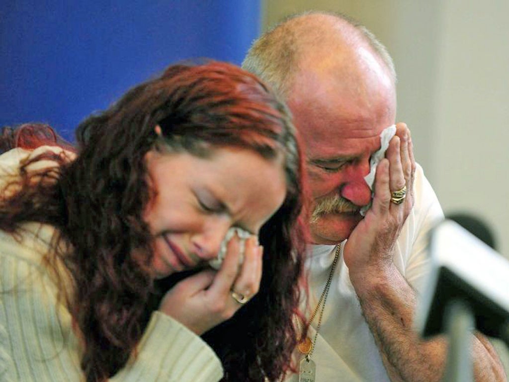 Mick Philpott and his wife, Mairead, break down as they speak to the media yesterday. They thanked emergency services and rescuers for their help