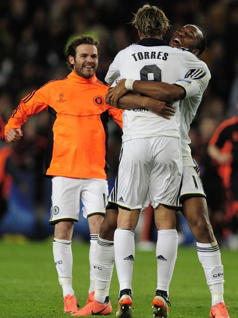 Fernando Torres and Didier Drogba celebrate a goal