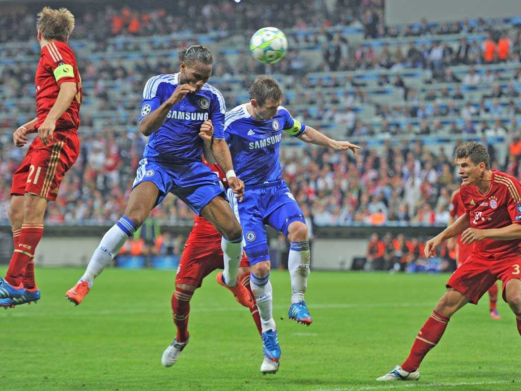 Didier Drogba heads in