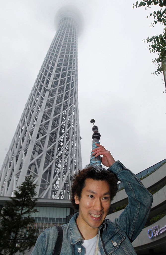A view of Tokyo Skytree, the world's tallest broadcasting tower at 634 metres (2080 feet), in Tokyo in this photo taken by Kyodo on May 21, 2012. The tower opened to the public on Tuesday, with hundreds of people entering the tower and its large shopping mall. Picture taken May 21, 2012.