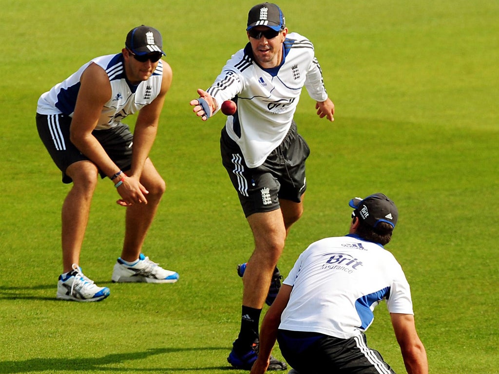 Tim Bresnan, Kevin Pietersen and Alastair Cook practise catches at Trent Bridge