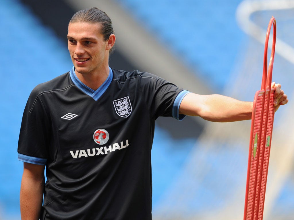 Andy Carroll pictured training yesterday