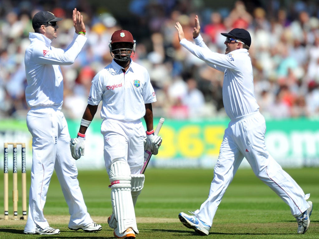 England players celebrate the wicket of West Indies batsman Darren Bravo
