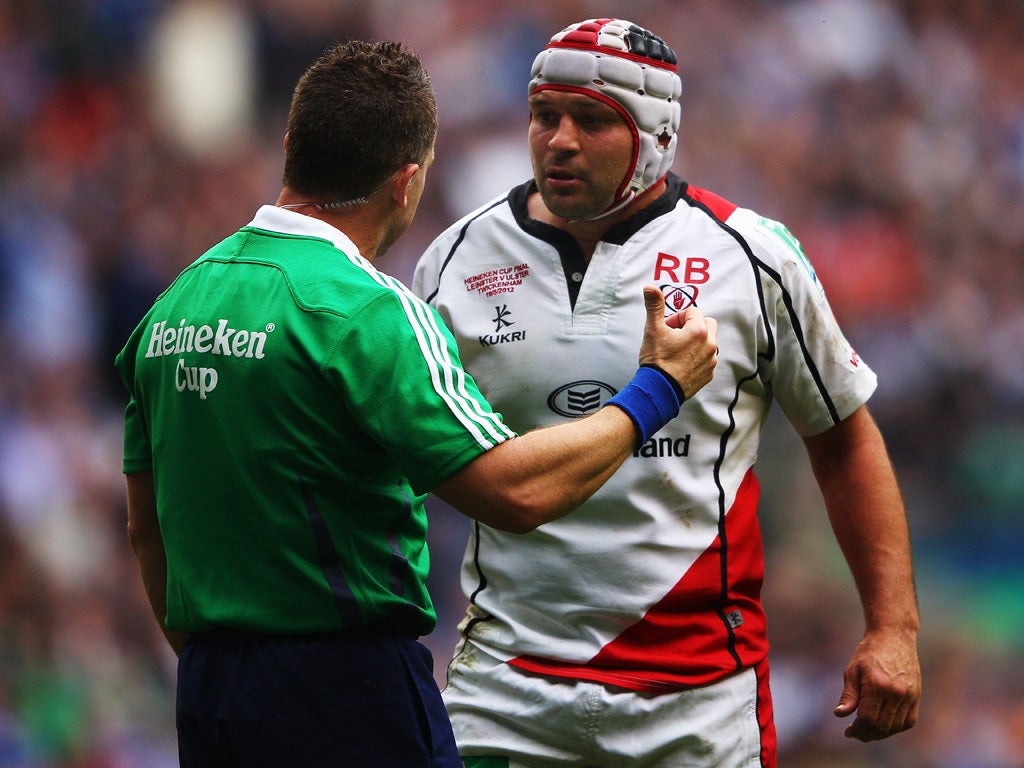 Nigel Owens speaks to Ulster's Rory Best during the Heineken Cup final