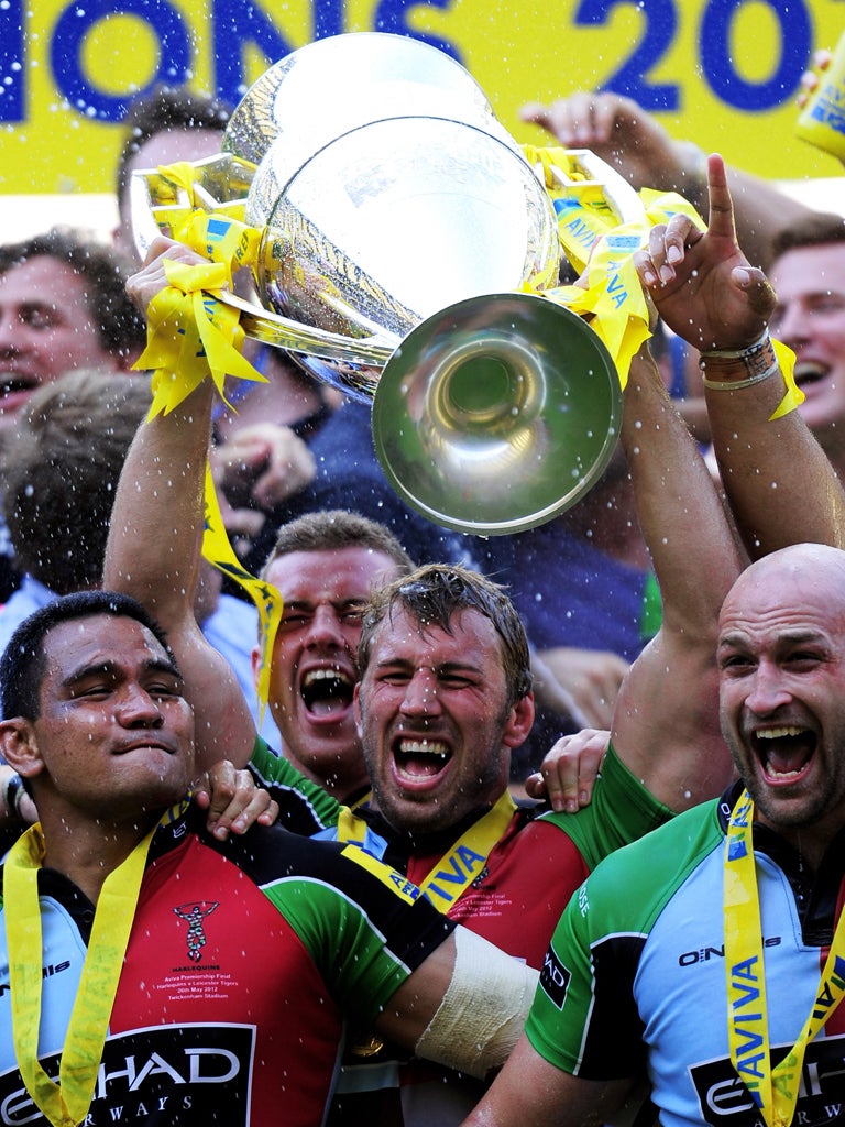 Skipper Chris Robshaw celebrates with the Aviva Premiership cup