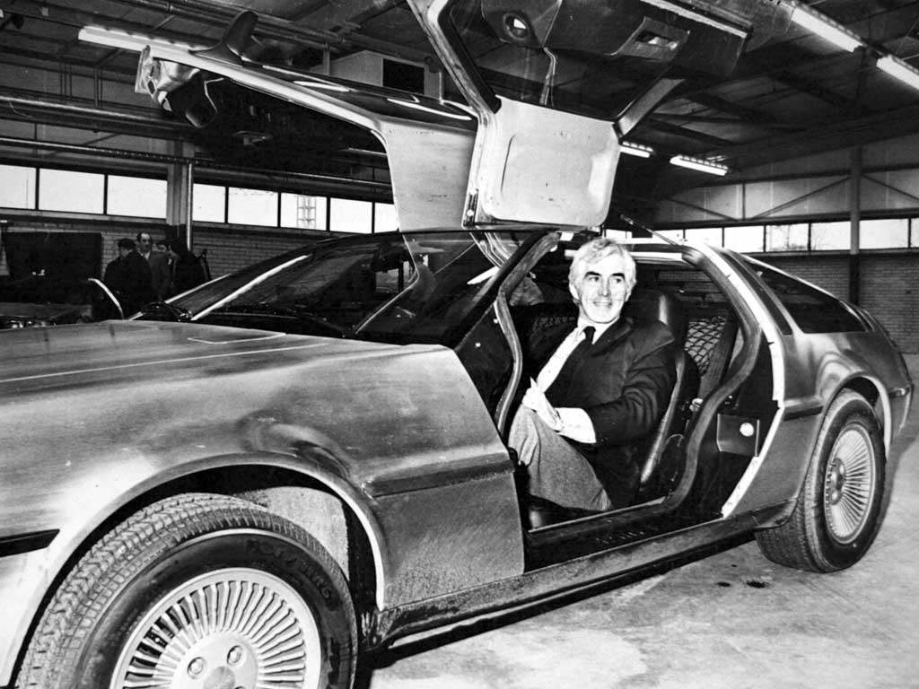 Trouble in store: John DeLorean, pictured behind the wheel of his gull-winged sportscar in 1981