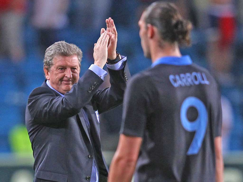 Roy Hodgson applauds the England fans at the end of the game