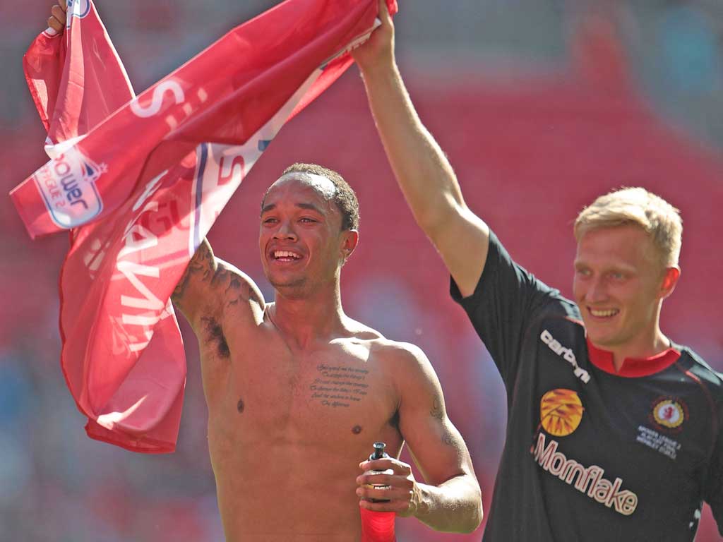 Crewe’s Byron Moore (left) celebrates with A J Leitch-Smith