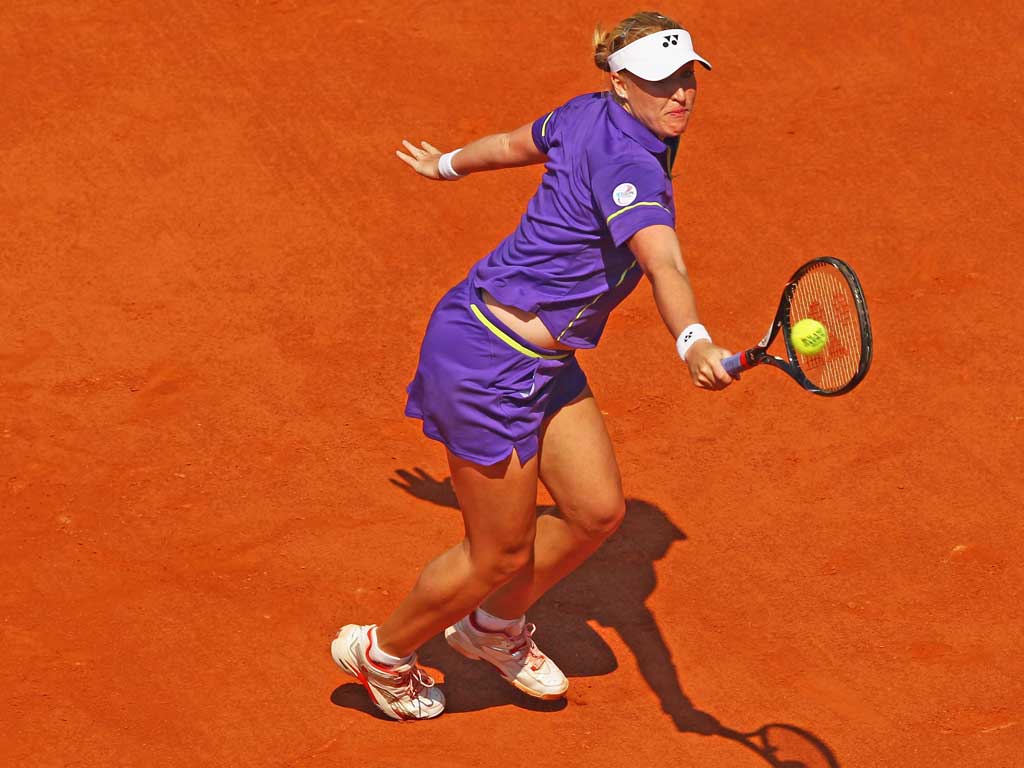 Elena Baltacha stretches for a backhand during yesterday’s
defeat to Sam Stosur