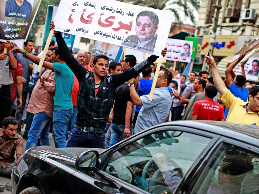 Coptic Christians protest in Cairo yesterday, demanding the release of Copts detained for political reasons