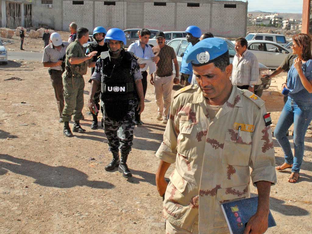 UN monitors have supported opposition claims that regime forces were behind the massacre