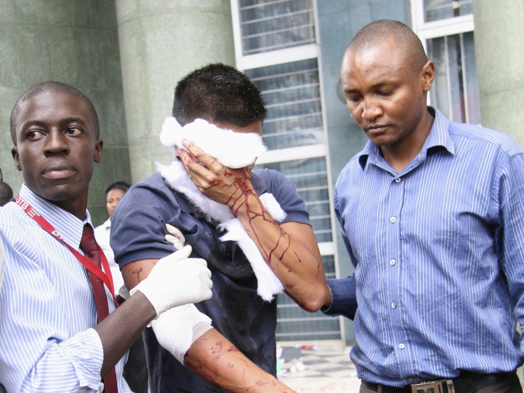 Medics help a victim of the blast in a shopping centre