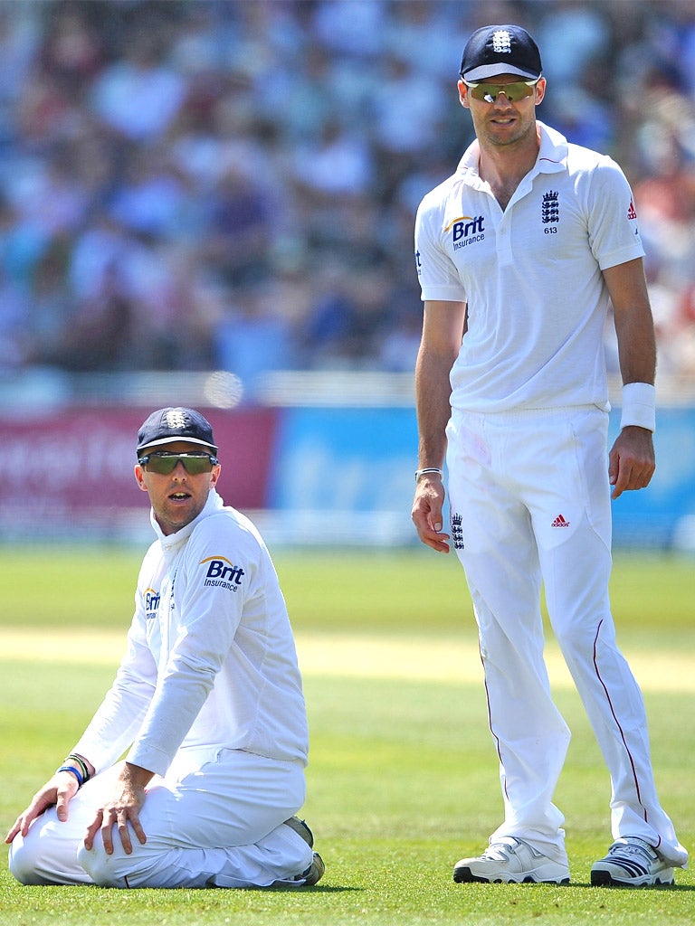 Graeme Swann (left) and Jimmy Anderson in action at Trent Bridge