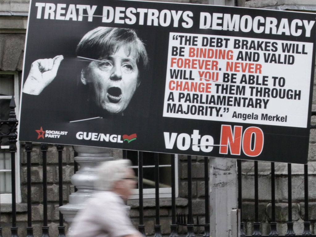 A sign for the No campaign in Dublin features German Chancellor Angela Merkel