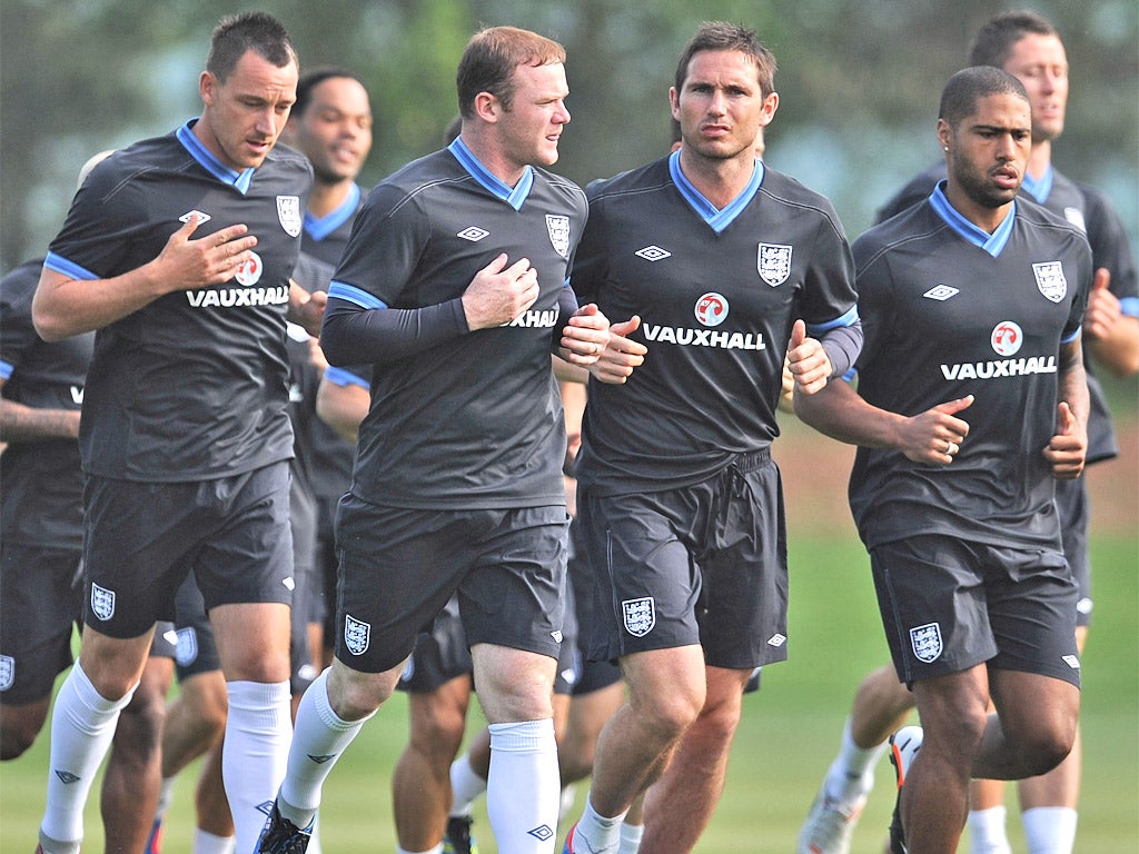 John Terry, Wayne Rooney, Frank Lampard and Glen Johnson train at London Colney yesterday