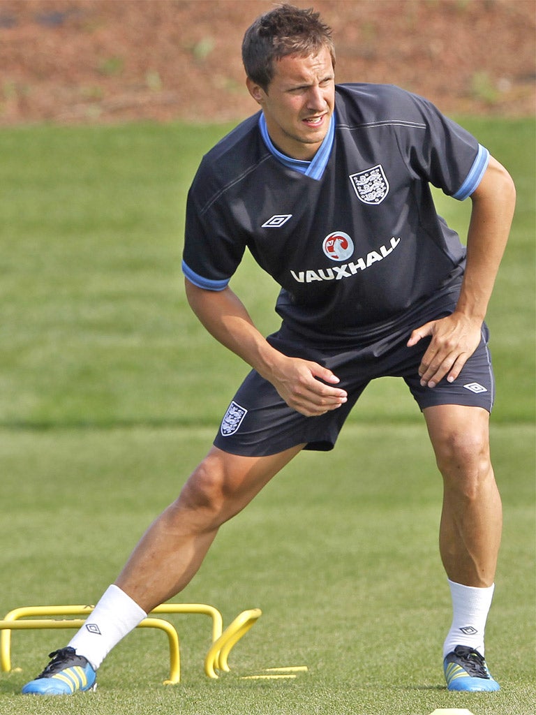 Phil Jagielka stretches during an England training session yesterday