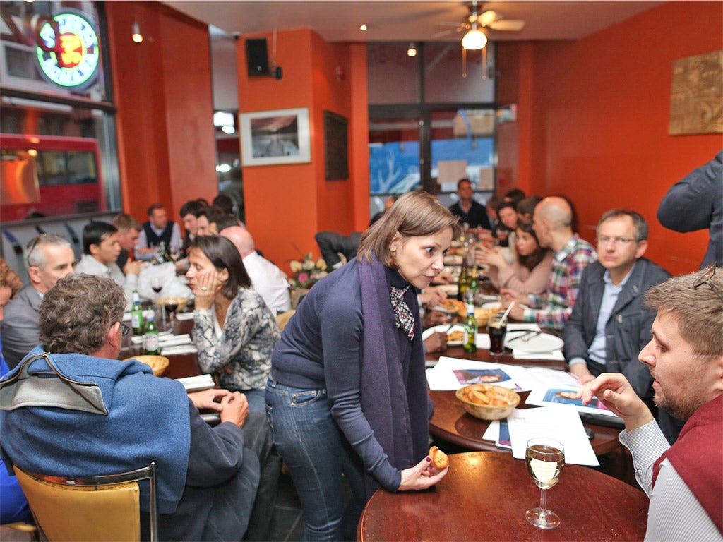 Emmanuelle Savarit puts her message across at the pizzeria Romana, South Kensington