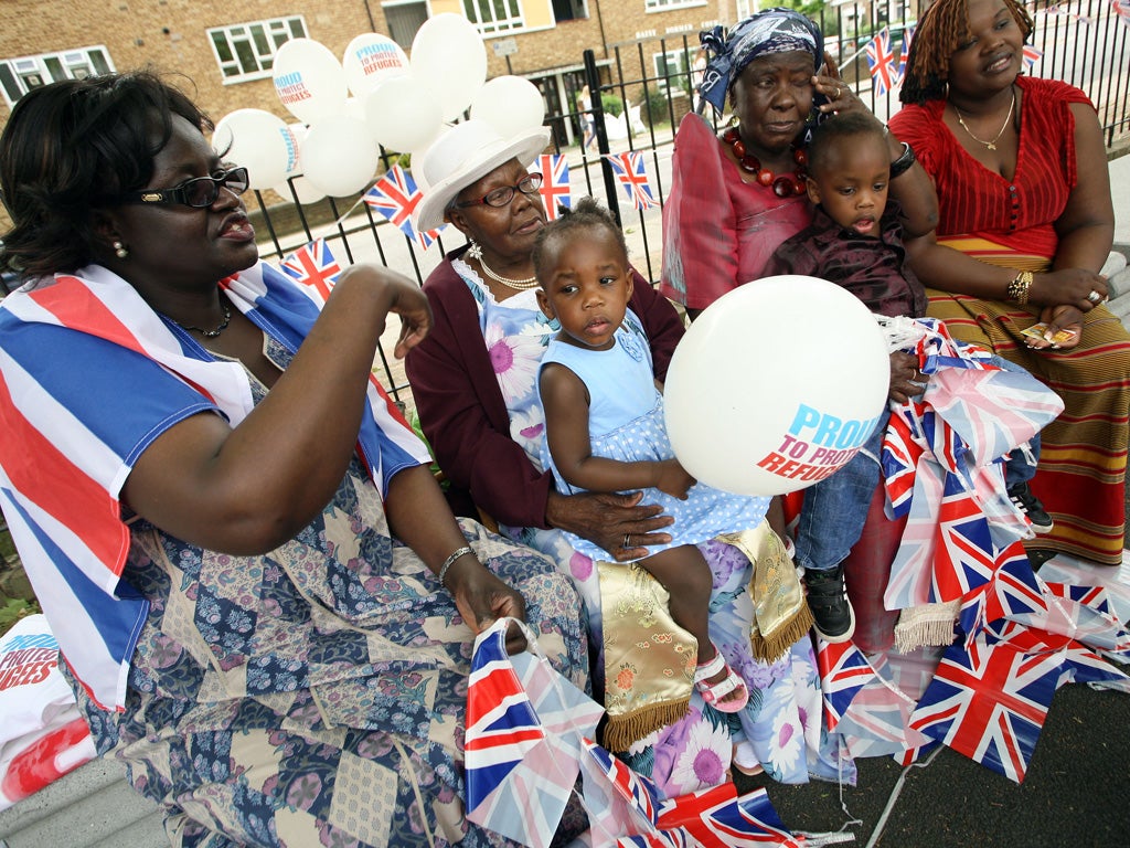 Ugandan refugees enjoy a jubilee street party in Brixton, south London