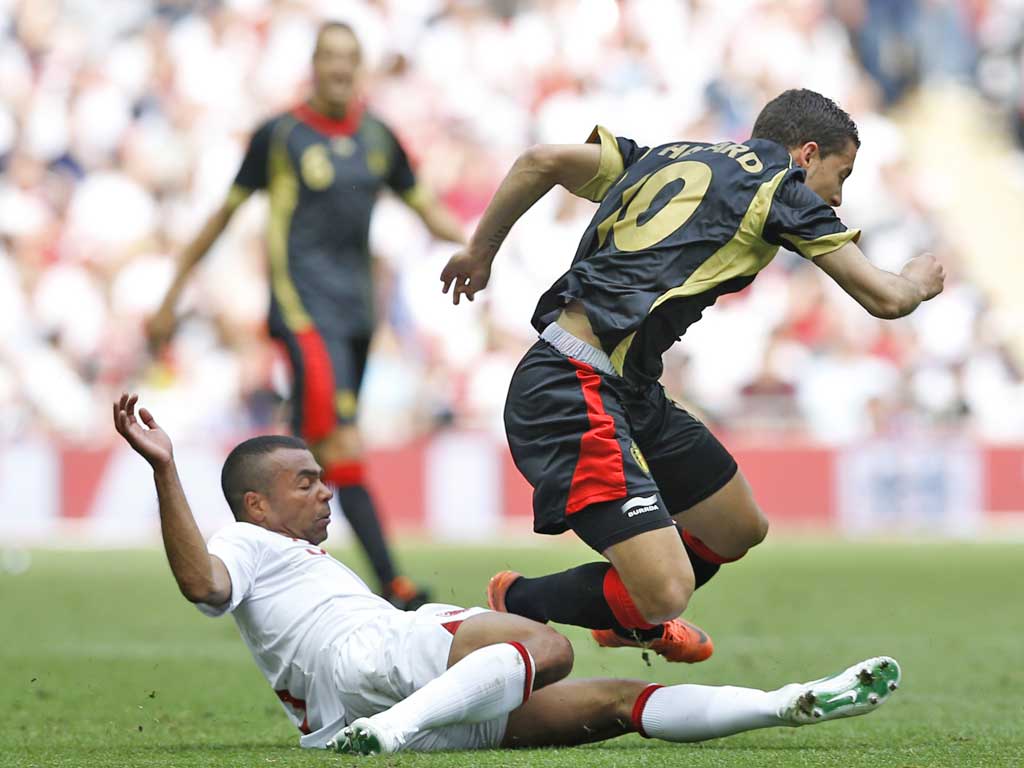 Ashley Cole introduces himself to his future Chelsea team-mate Eden Hazard on Saturday