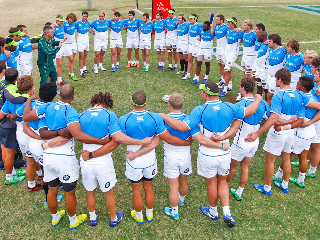 Springbok coach Heyneke Meyer talks to his players ahead of Saturday's first Test against England