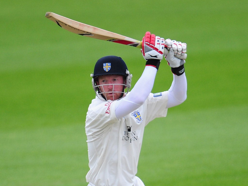 Paul Collingwood hits out during his doughty knock yesterday