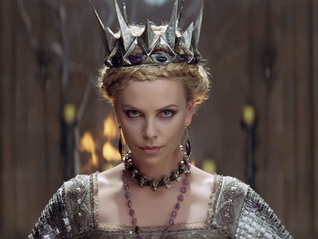 Charlize Theron (pictured) competes as queen with a surly action-adventurer Kristen Stewart in Snow White and the Huntsman